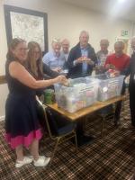 Members of Calverley Rotary Club filling Boxes to take to the foodbank